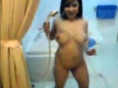 busty indonesian babe playing her boobs and in shower - drtuber - Indonesia