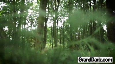 Watch this kinky grandpa get wild in the woods with his big tits out and his mouth full of fresh pussy - sexu.com