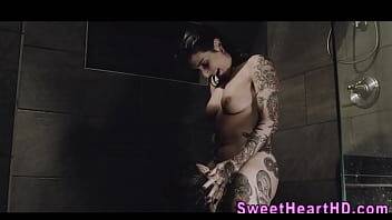 Inked les milf eaten out in the shower - xvideos.com